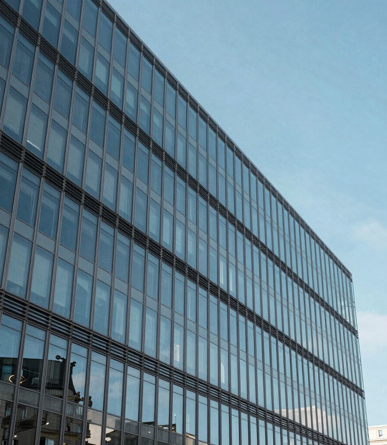 A minimalist architectural photograph of a modern financial office building in Paris, featuring clean glass lines reflecting a bright azure blue sky, European aesthetic, bright and precise lighting.