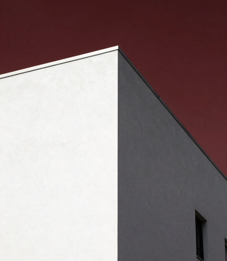 A minimalist architectural shot of a sharp, clean white corner against a deep dark red sky, reflecting power and clarity in a global metropolitan setting.