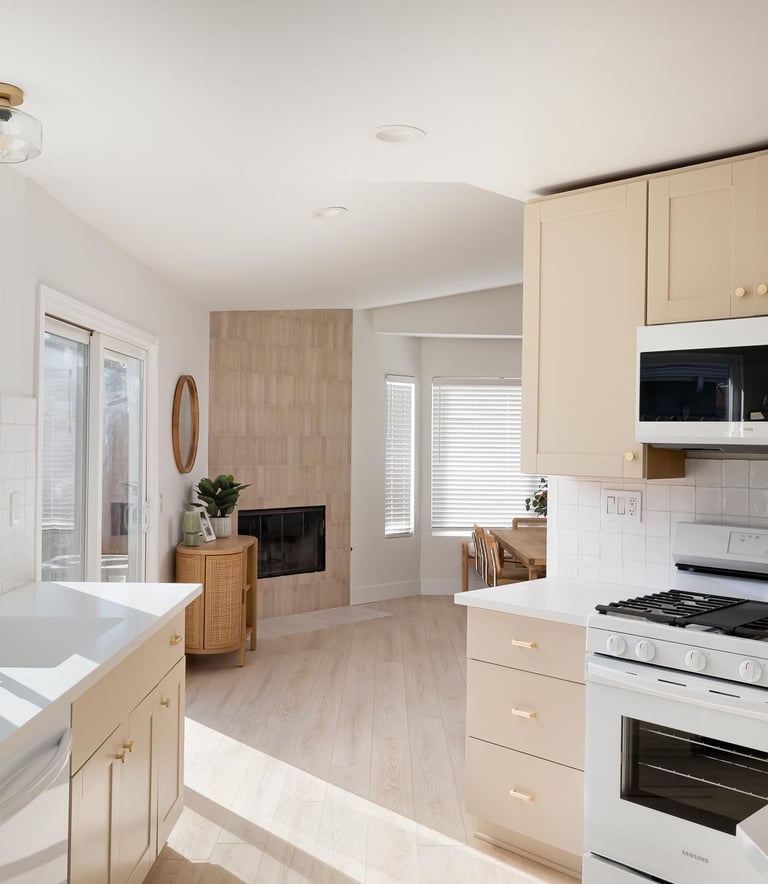 a kitchen with a stove top oven and a microwave