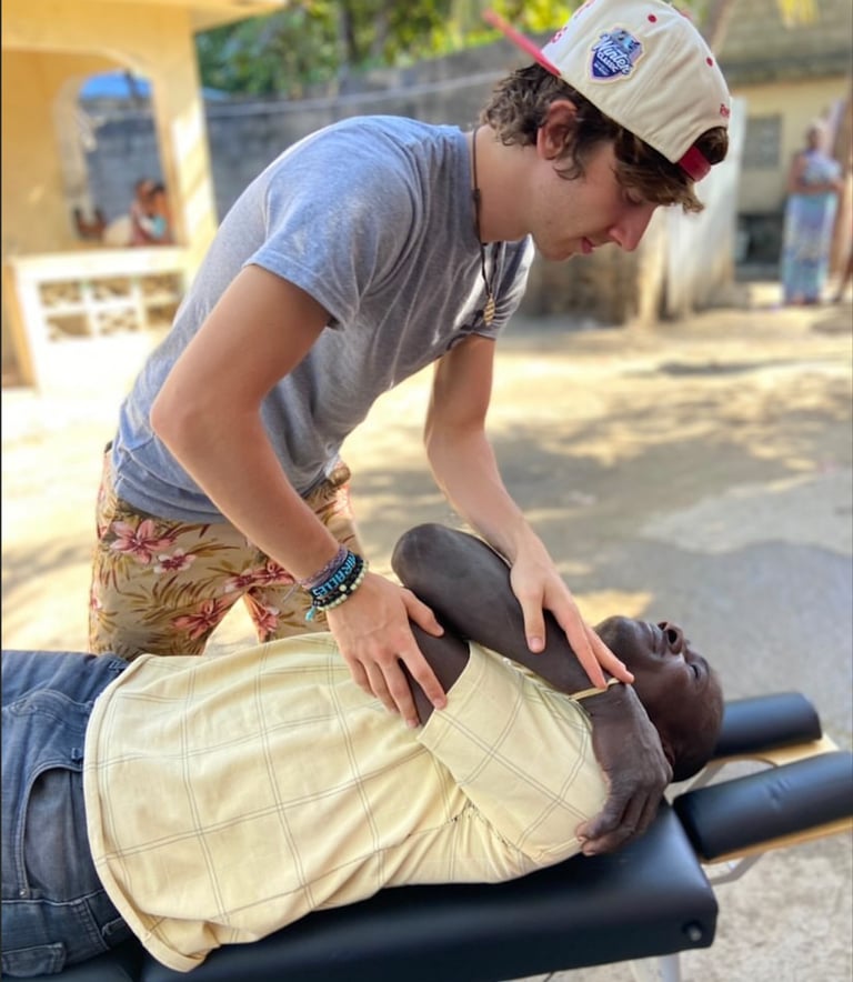 "Franklin TN chiropractor on a faith-led mission trip, adjusting children and families in Haiti