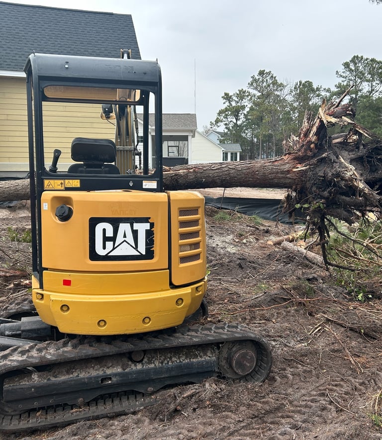 Excavation equipment clearing land in Holly Ridge NC
