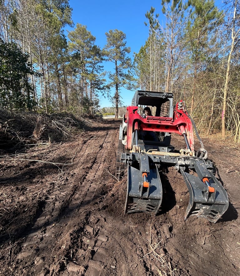 Excavation equipment clearing land in Holly Ridge NC