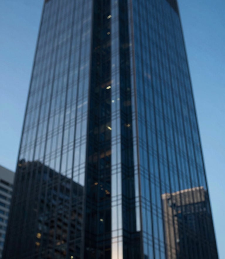 An abstract, high-contrast photograph of a modern glass skyscraper reflecting a clear blue sky, symbolizing corporate transparency and high-reaching financial goals. Deep #0A2A44 navy tones in the shadows.