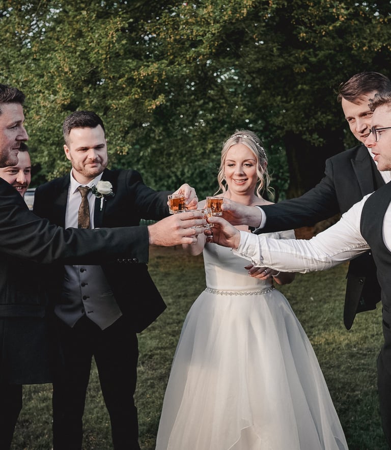 Wedding guests celebrating during evening reception in Leeds – documentary wedding photography by Th