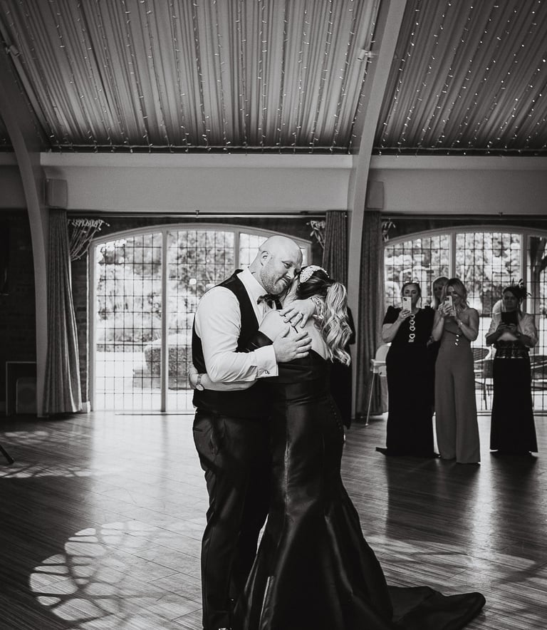 Wedding photographer working during ceremony in Leeds – documentary wedding photography by The Weddi