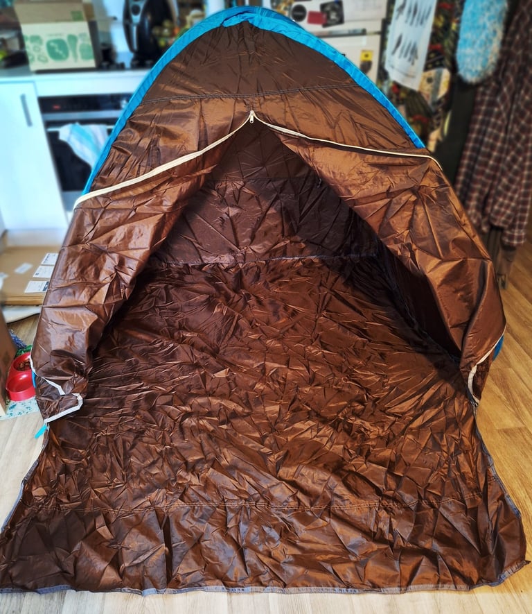 A camp tent set-up indoors