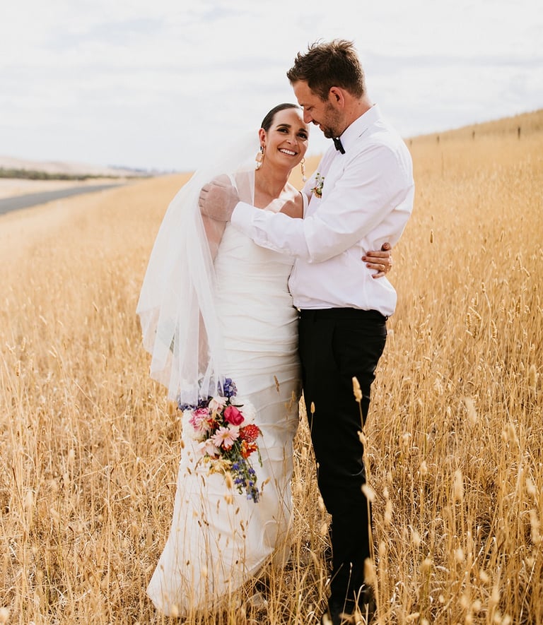 Happy couple walking down the aisle after saying I do on the Sunshine Coast and Noosa Wedding