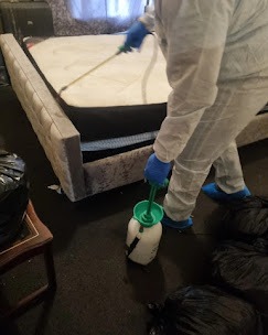 a person in a white suit and a person in a white suit and a white