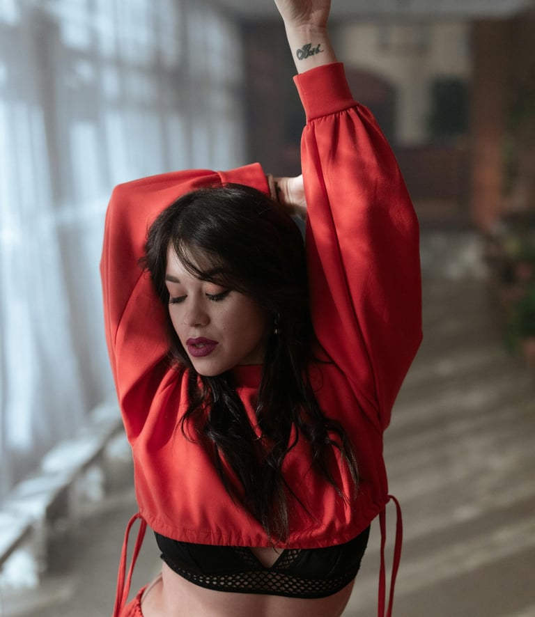 girl dancing in red top