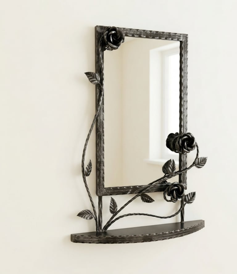 Hand-forged wrought iron wall mirror with decorative metal roses and a small shelf.
