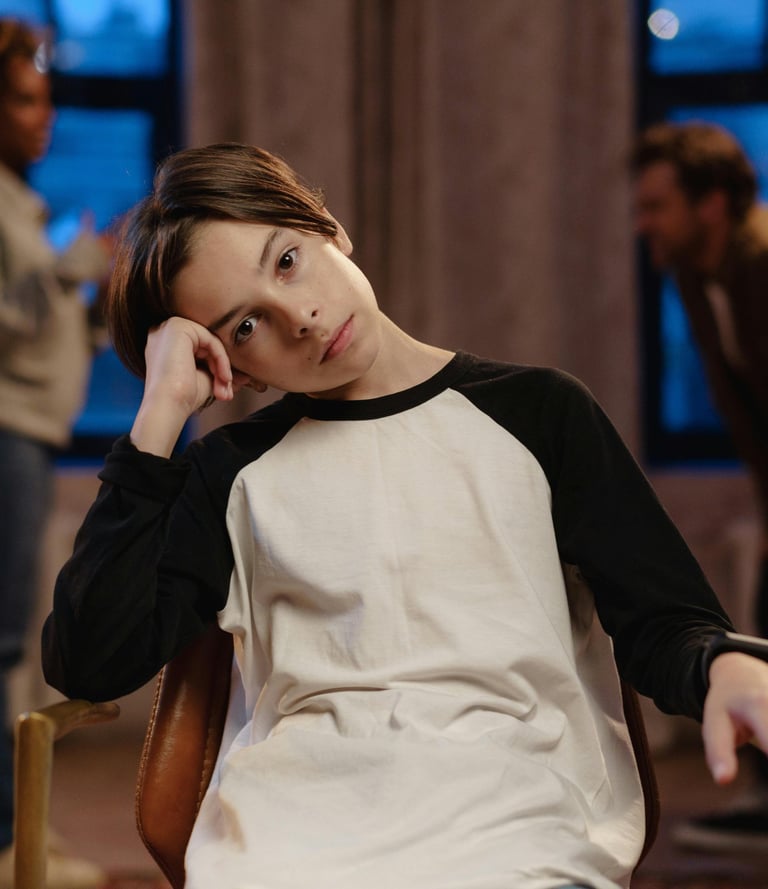 a woman sitting in a chair with a man in a chair