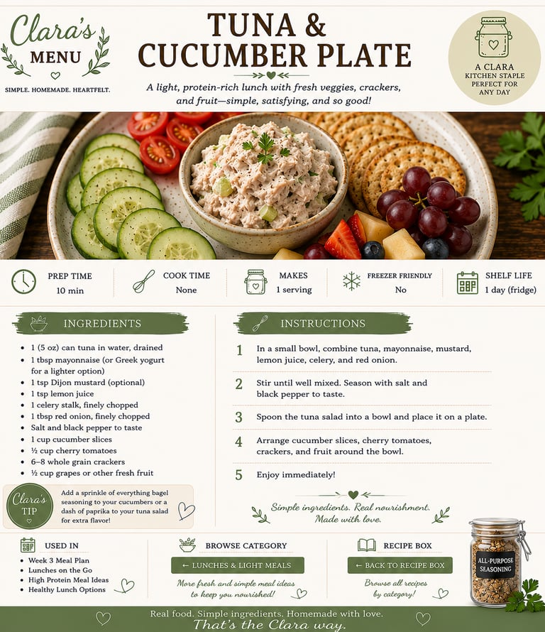 Healthy tuna salad recipe card with cucumber slices, crackers, and fruit on a wooden plate.