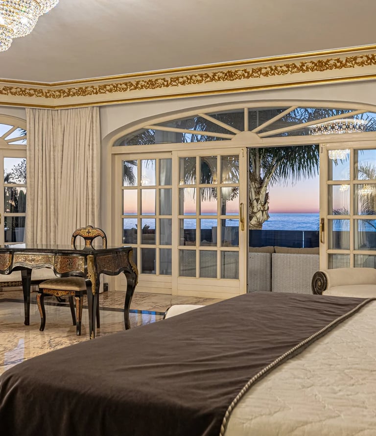 Master bedroom with terrace access in luxury coastal villa Marbella Spain