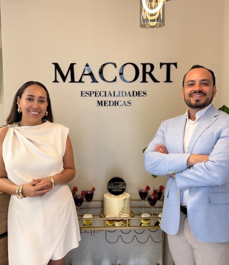 Medical professionals at Macort Especialidades Medicas clinic celebration.