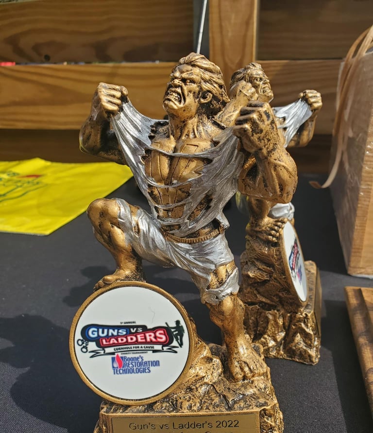 Guns vs Ladders Cornhole trophy