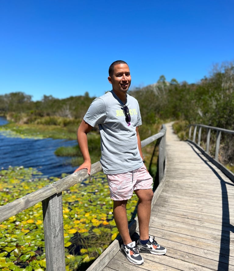 gameed Omar, image by the pond of a man 