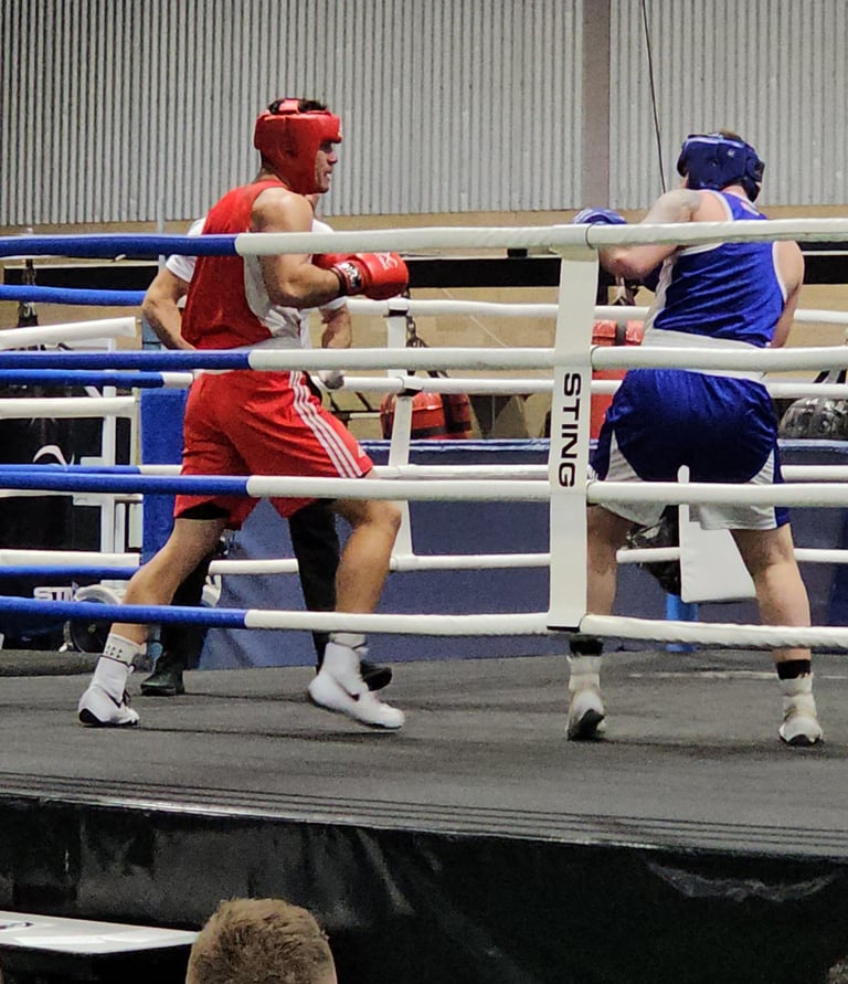 Athletes in a ring during a bout.
