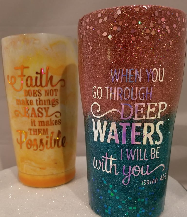 two metal tumblers decorated with faith statements
