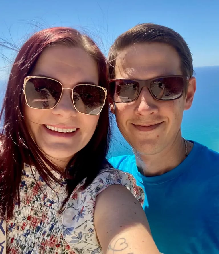 a man and woman taking a selfie with a selfie