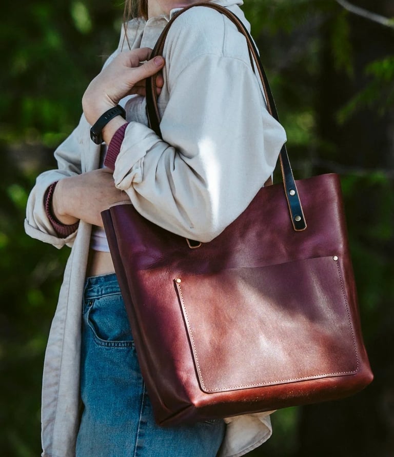 a woman in a white shirt and jeans jacket