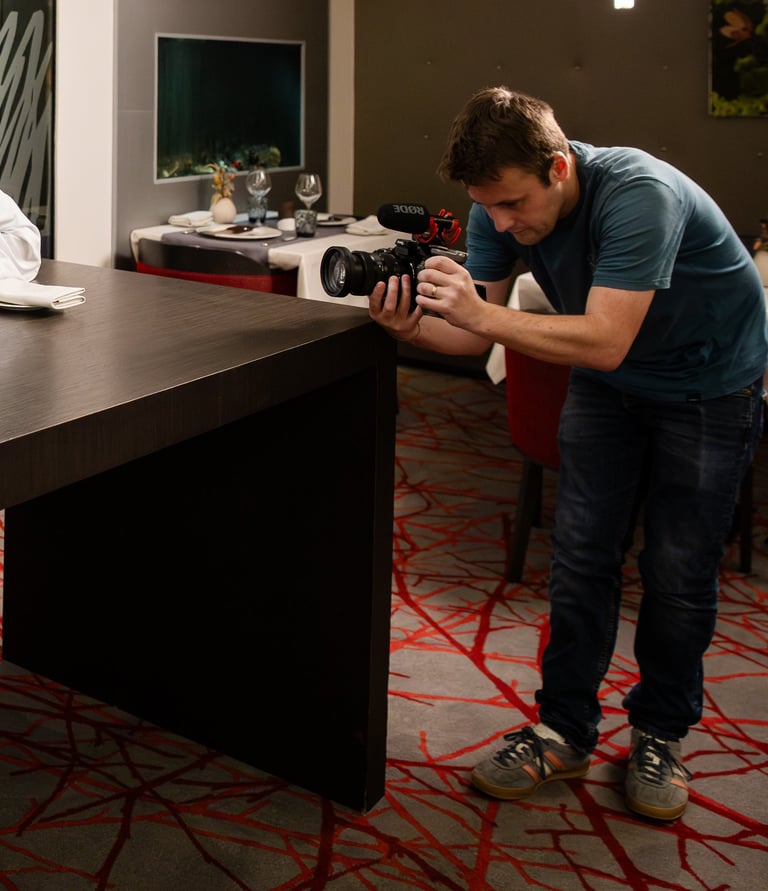 a man and woman are sitting at a table
