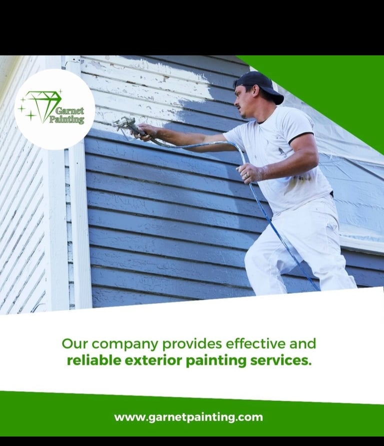 Garnet Painting team working on exterior house painting with company logo visible”