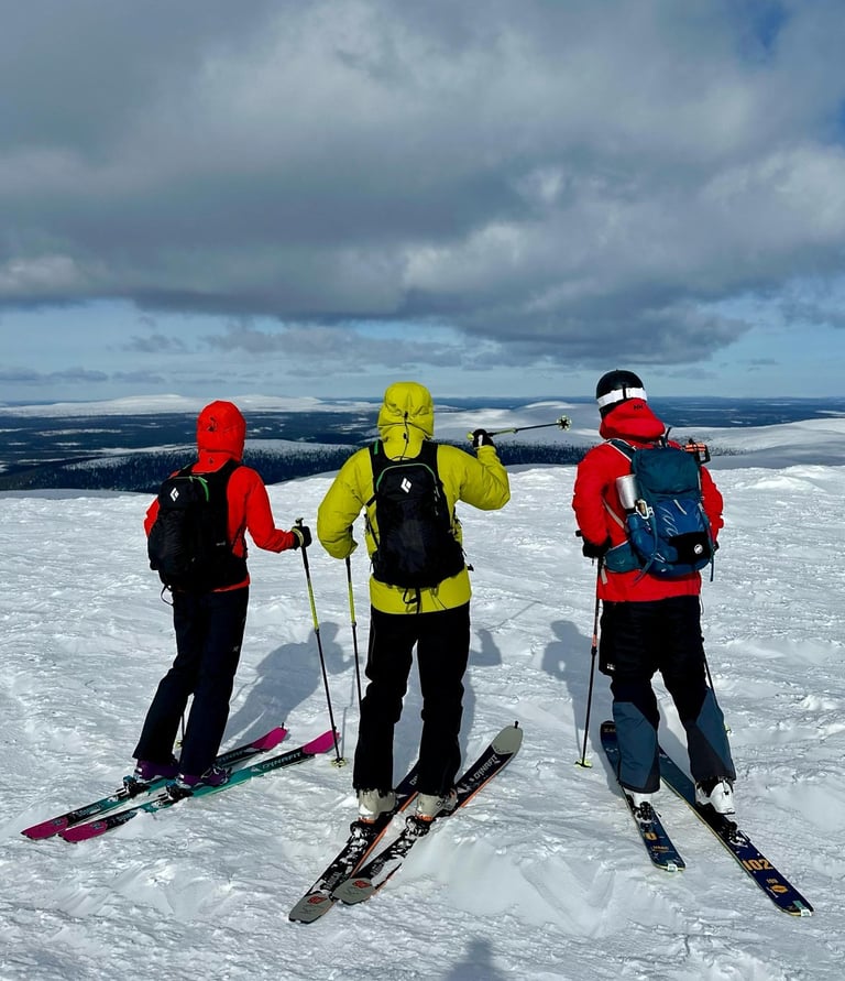 3 people ski touring in pallas, lapland