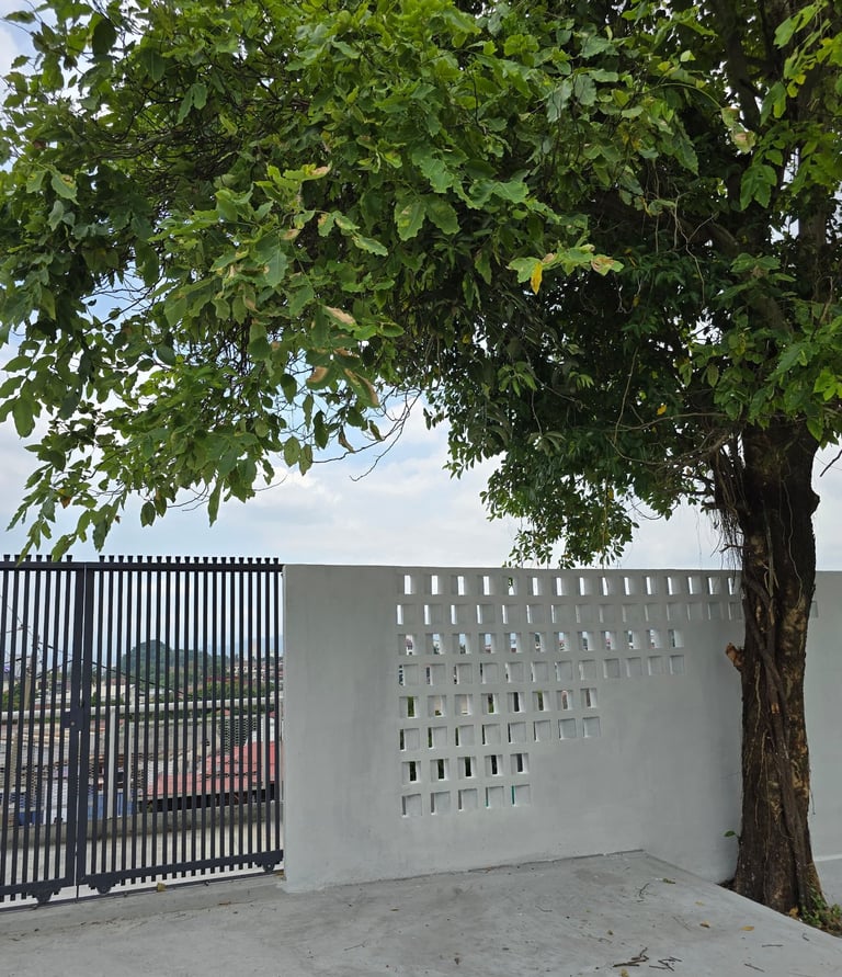 Kuari21 event space secondary entrance with big tree