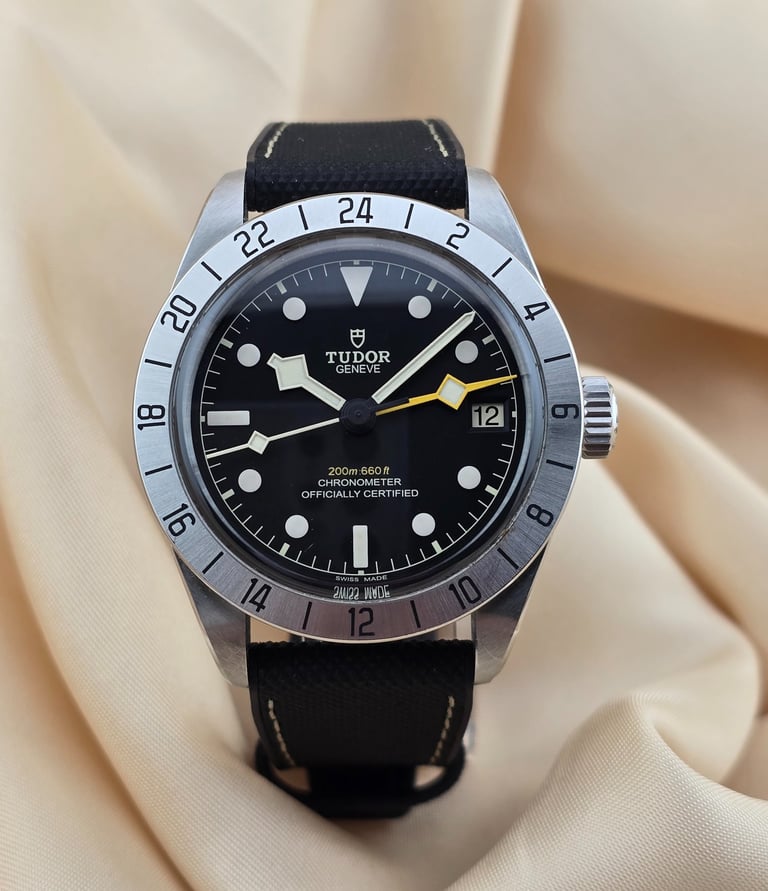 Tudor Black Bay Pro watch with vulcanised rubber strap and stainless steel case