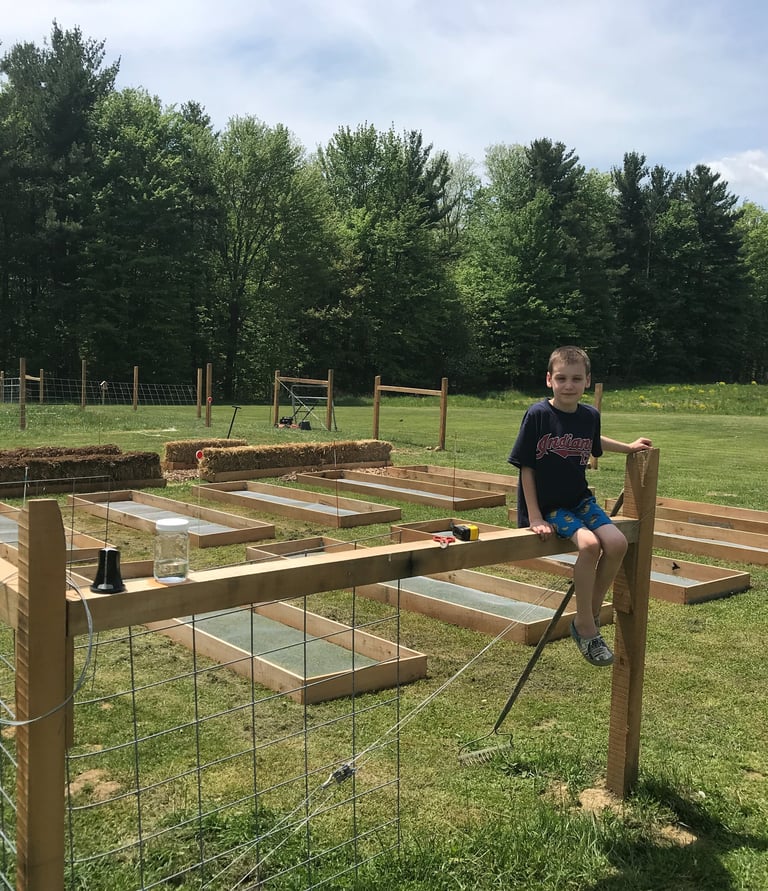 Building a fence and raised garden beds at our little Shire.
