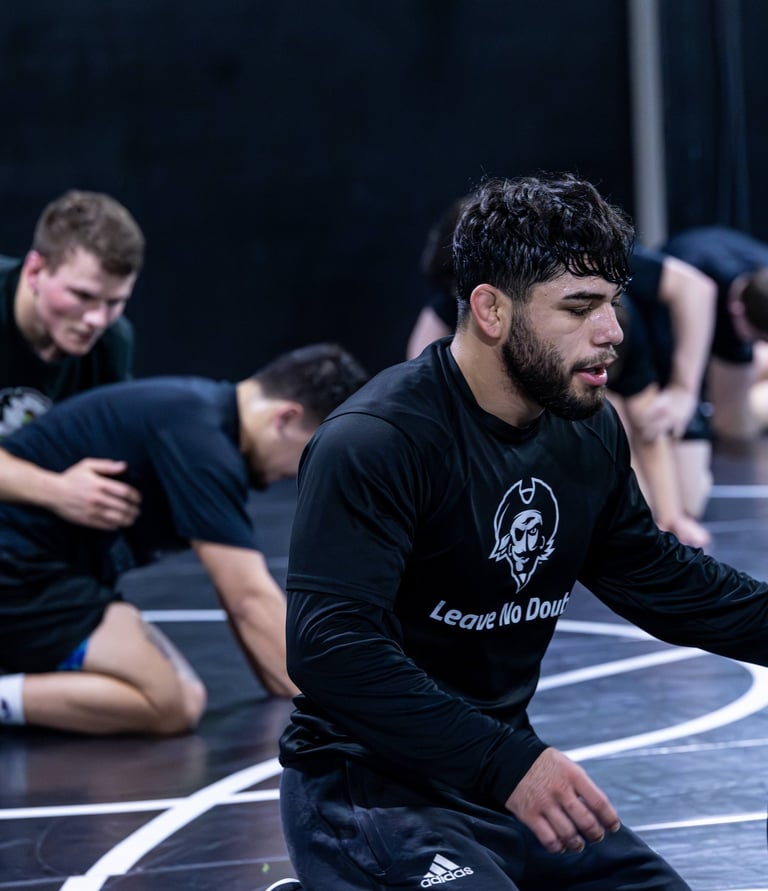 hispanic wrestlers practicing