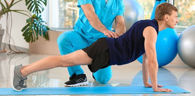 Manual physiotherapy for back pain recovery by expert therapist at home.