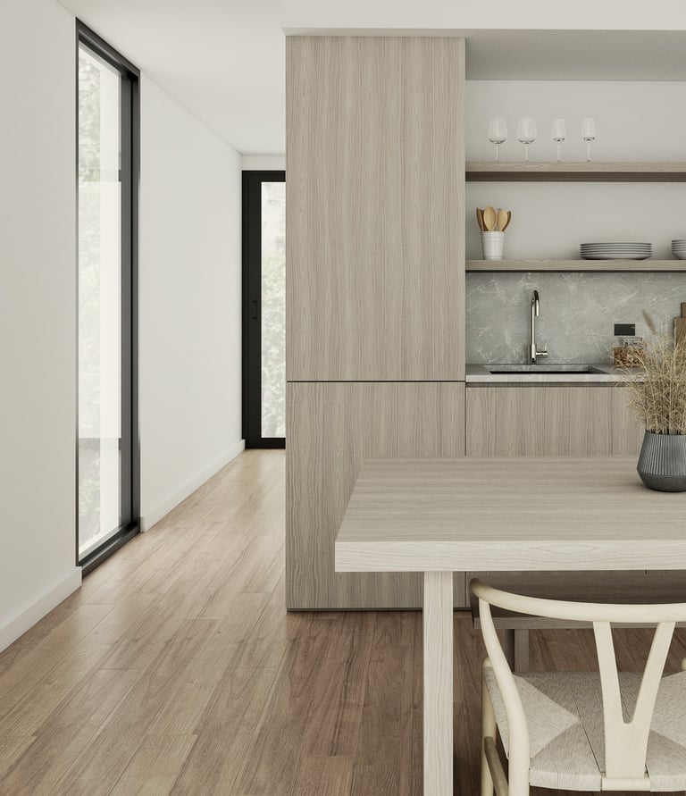 a kitchen with a table and chairs and a vase with flowers