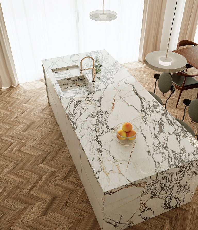 Un îlot de cuisine avec un plan de travail en marbre