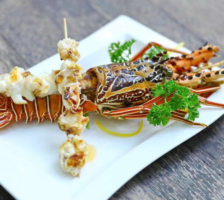 a lobster crab crab and lobster on a plate