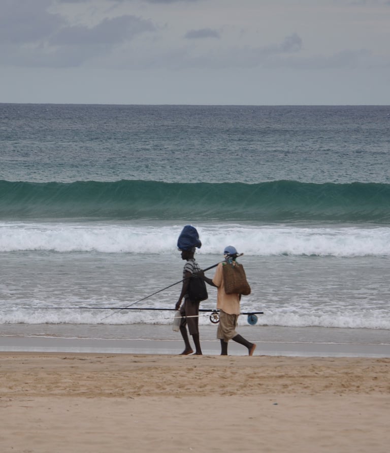 men fishing at tofo Beach, Praia do Tofo, Mozambique