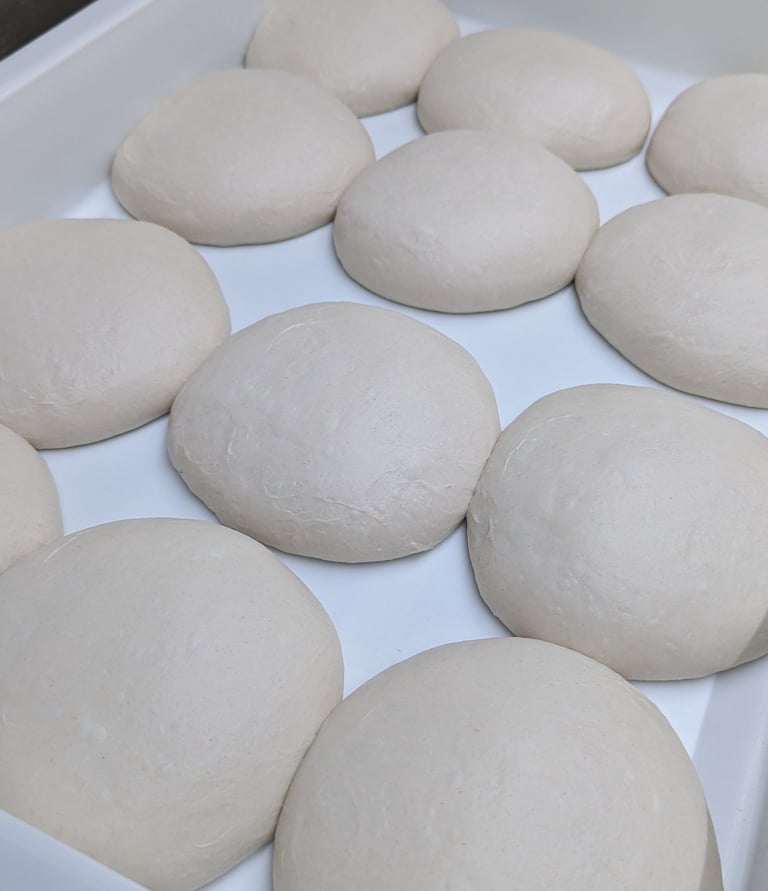 hand made pizza dough using flour imported from Italy