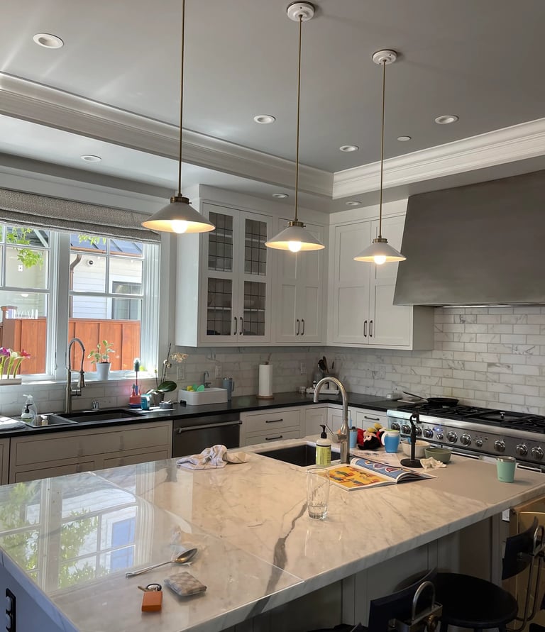 a kitchen with a large island and a large island