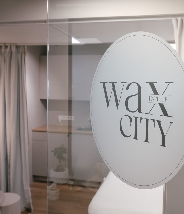 a sign that says wax wax city