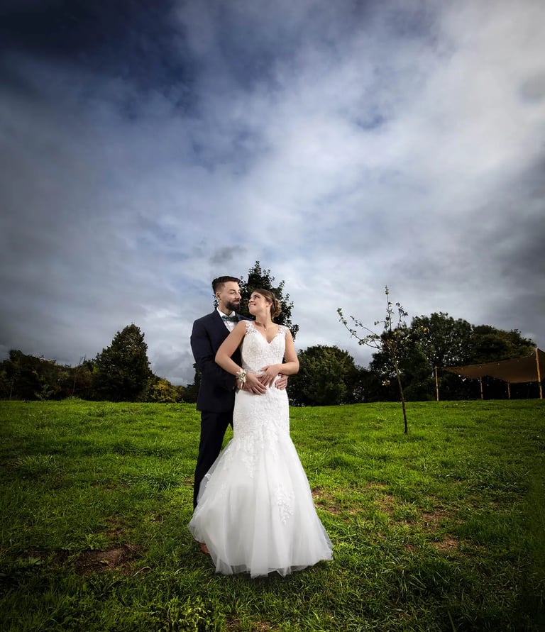 photographe mariage lille saint omer le touquet mariage a bride and groom standing in a field