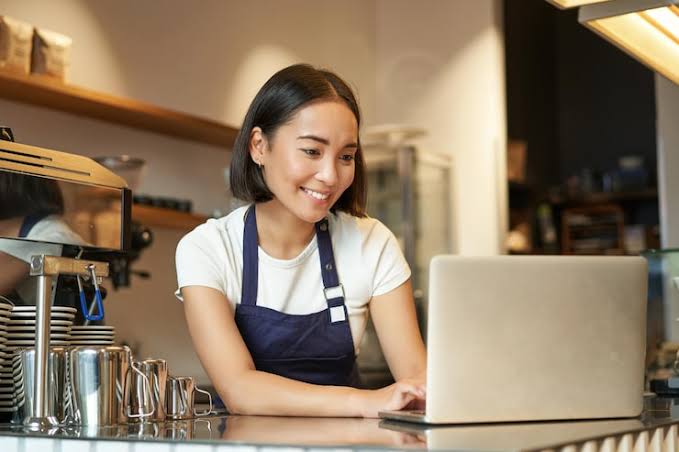 Small business owner saving time with ShuvAI automated customer service management