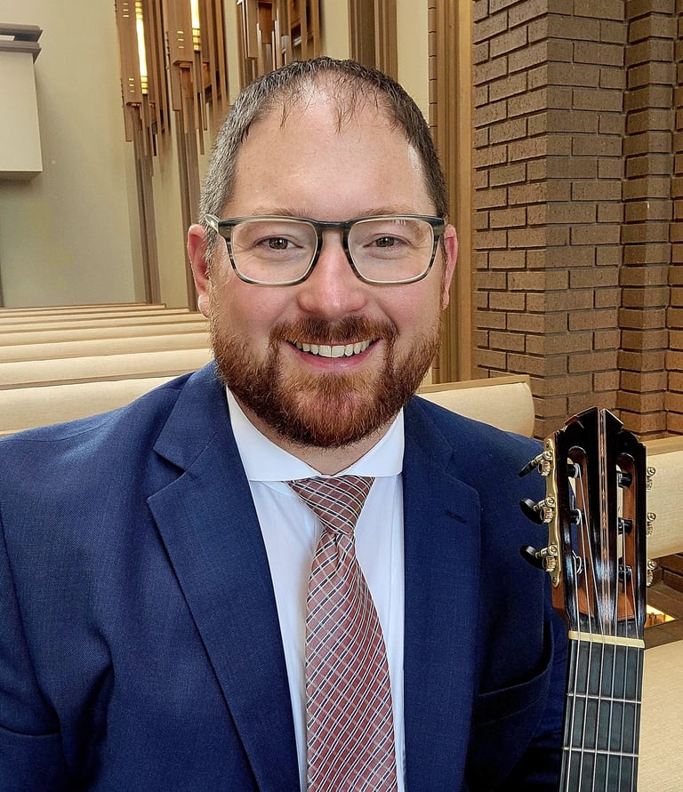 Dan Kyzer plays guitar at a wedding in Fort Worth, Texas