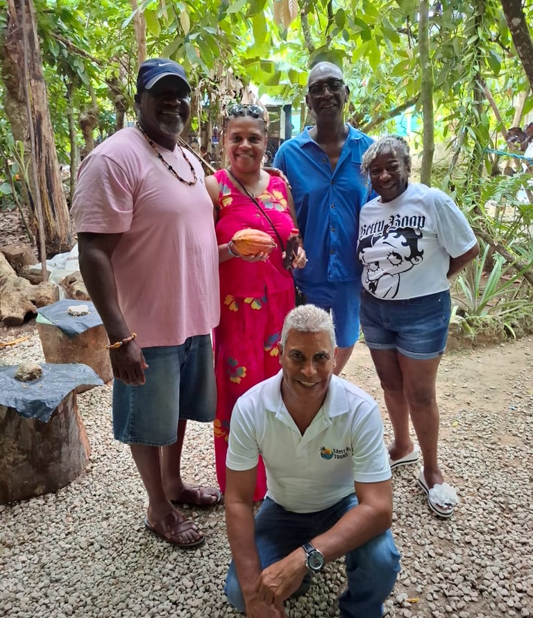 group of happy tourists posing in a garden during a punta cana local tour