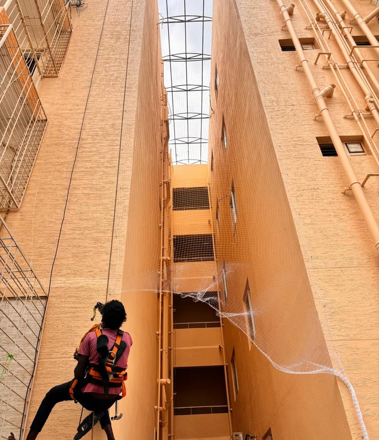 nstalled pigeon net on an apartment balcony in Andheri West.