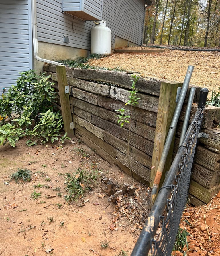 Existing wall deteriorated, removed to install new retaining wall block
