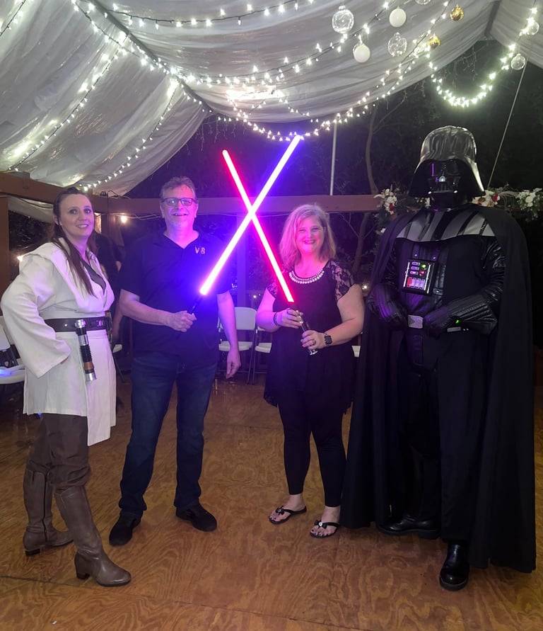 couple with light sabers