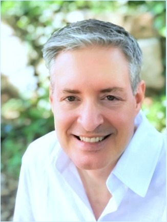 profile picture of a man with a white shirt