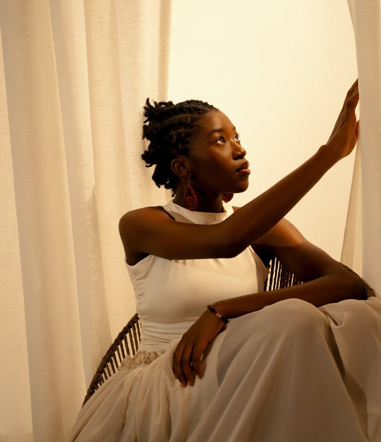 A focused gaze from a sun-kissed poet, spotlighting one of the best spoken word artists in Nigeria