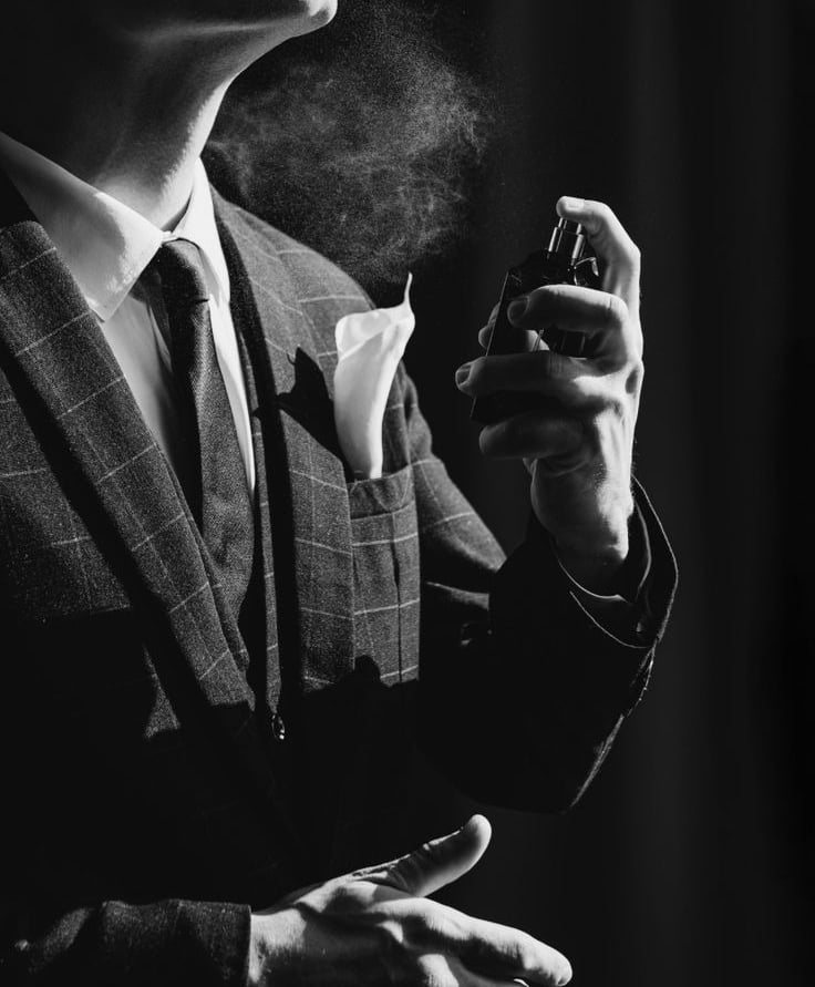 Gentleman applying a fragrance