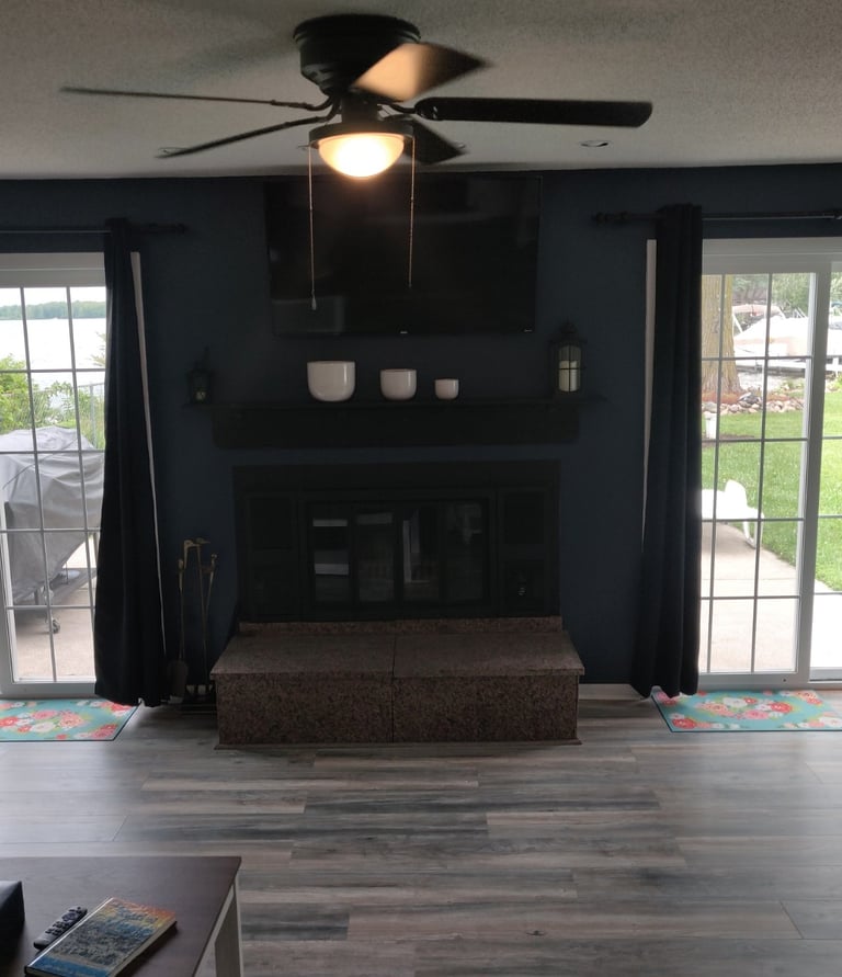 living room lakeside views smart tv fireplace southern michigan vrbo airbnb dock short term rental